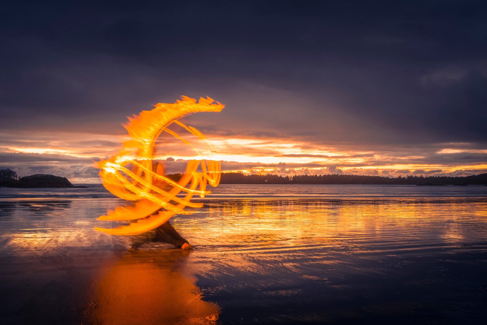 Motion-blur-photography-session-outdoor-on-the-beach-with-fire-dancer-in-Tofino