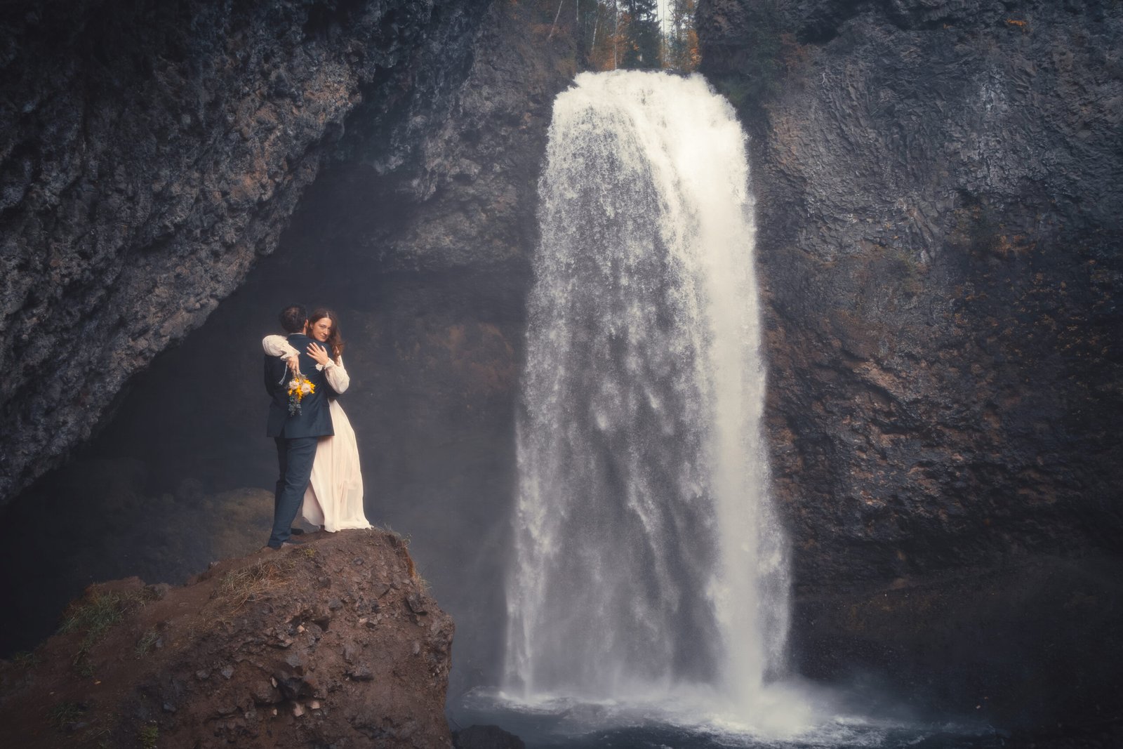 intimate elopement location for adventurous couple wedding photography session near a waterfall in Well Grey provincial park British Columbia