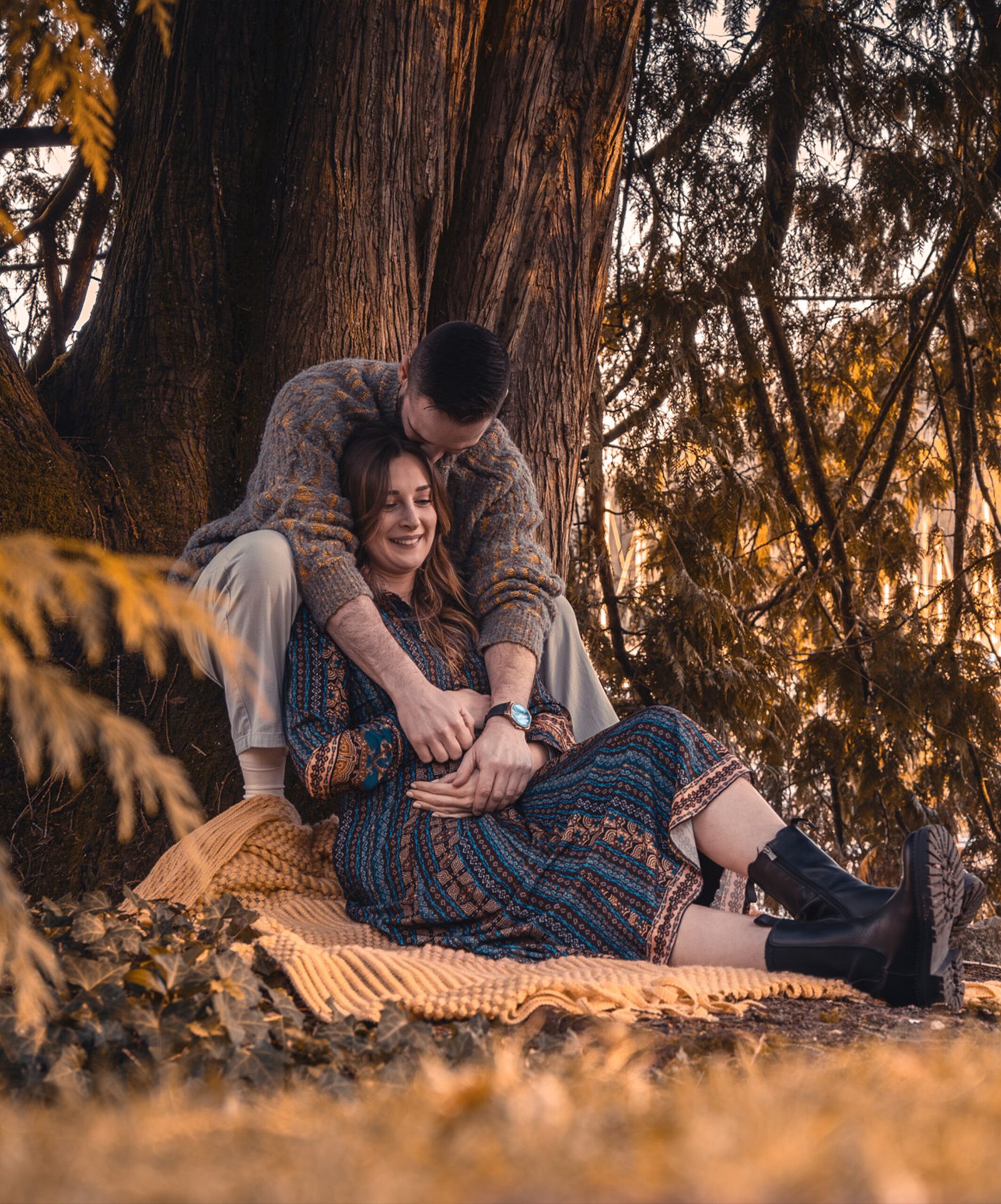 mother-to-be portrait outdoor in nature photography session by the ocean with professional photographer in vancover during golden hours